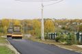 В барнаульском поселке Казенная Заимка асфальтируют дорогу