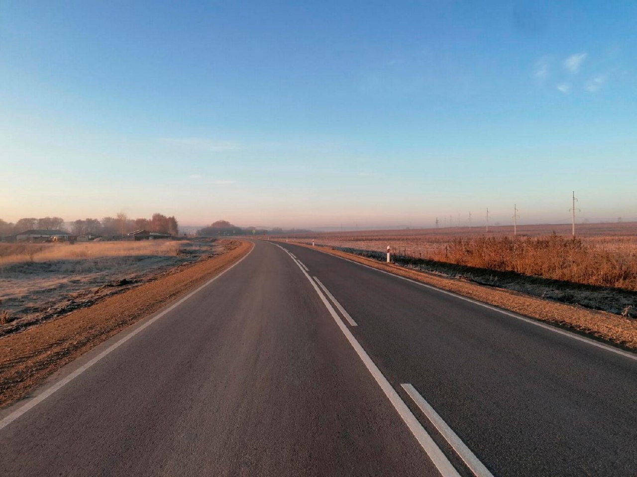 Более 10 км трассы обновили в Третьяковском районе Алтайского края Более 10 км трассы обновили в Третьяковском районе Алтайского края